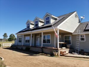 House in the process of being prepped to be painted